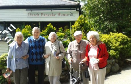 A caring staff member with a resident